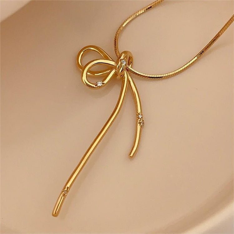 GOLD BOW NECKLACE