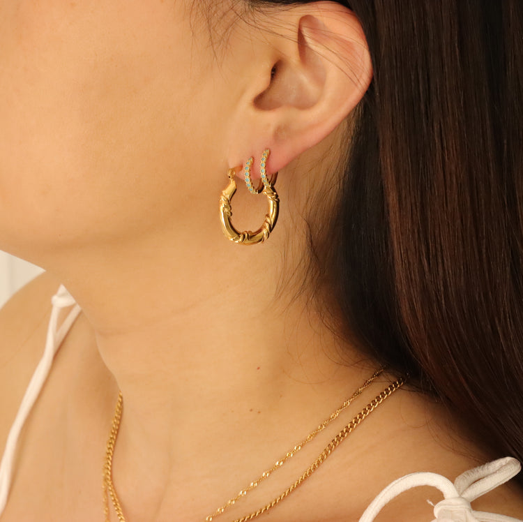 TWIST TUNNEL EARRINGS
