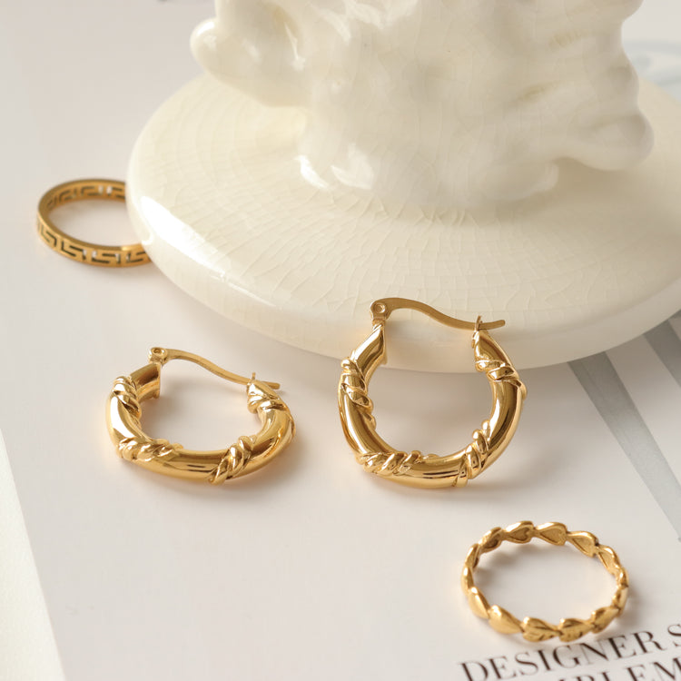 TWIST TUNNEL EARRINGS